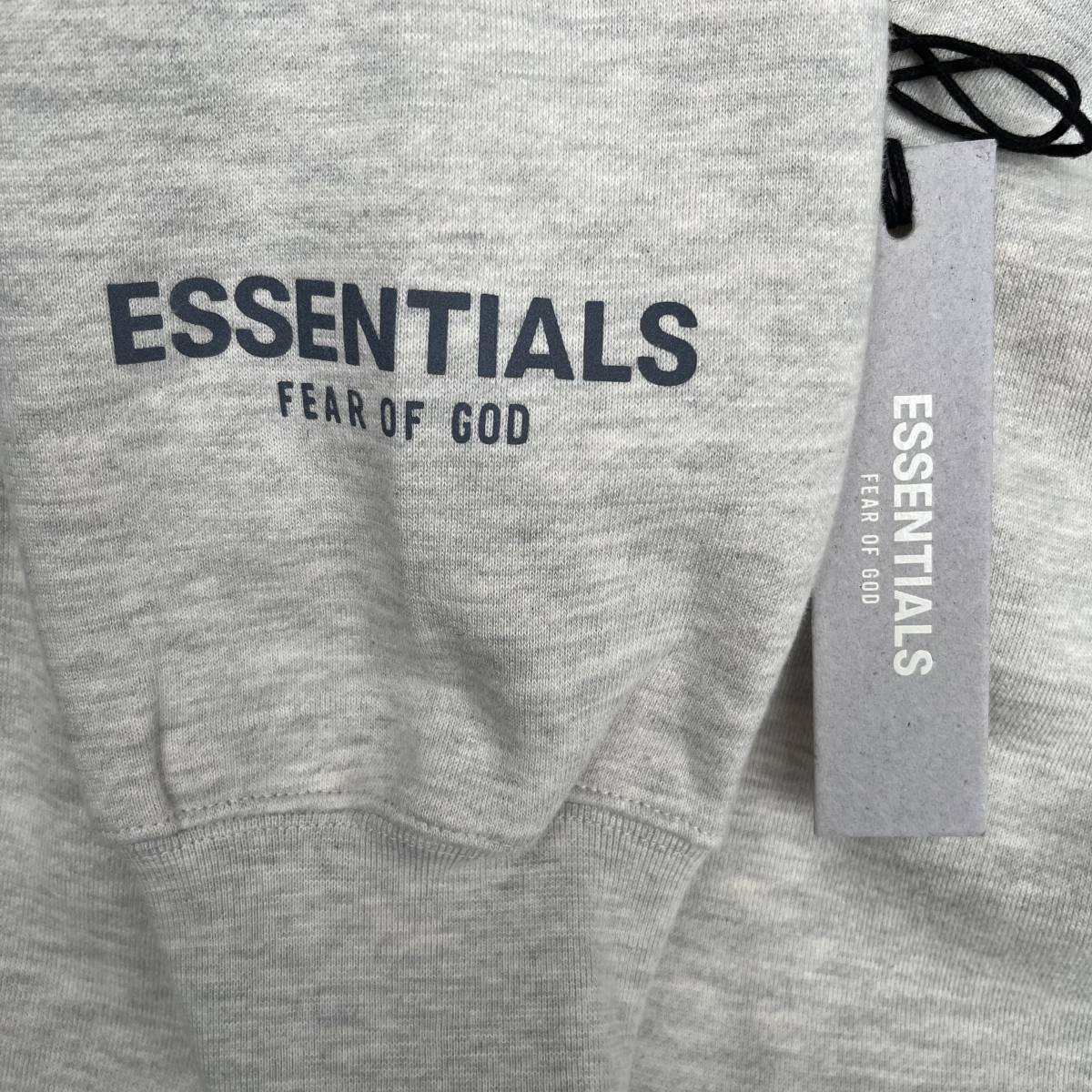 新品 FOG Fear Of God Essentials フィアオブゴッド エッセンシャルズ Mサイズ LOGOパーカー フーディ オートミール OATMEAL